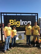 4 FFA members at Husker Harvest Days by Big Iron display